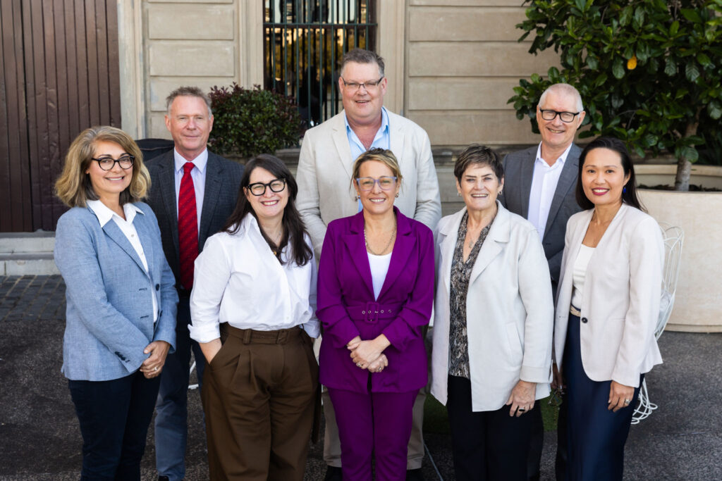 A group photo of key stakeholders at the Food System Horizons Launch. Back row, from left: Dr Michael Robertson (Acting Executive Director, Future Industries, CSIRO), Dr Rohan Nelson (Director, Food System Horizons), Prof Matthew Morrell (Director, QAAFI). Front row, from left: Dr Tracy Henderson (Board Member, FAN), Ms Katie McRoberts (CEO, AFI), Ms Rachel Chambers (CEO, QFVG), Ms Sarah Pennell (COO, Foodbank Australia), Dr Lilly Lim-Camacho (Principal Research Scientist, CSIRO)